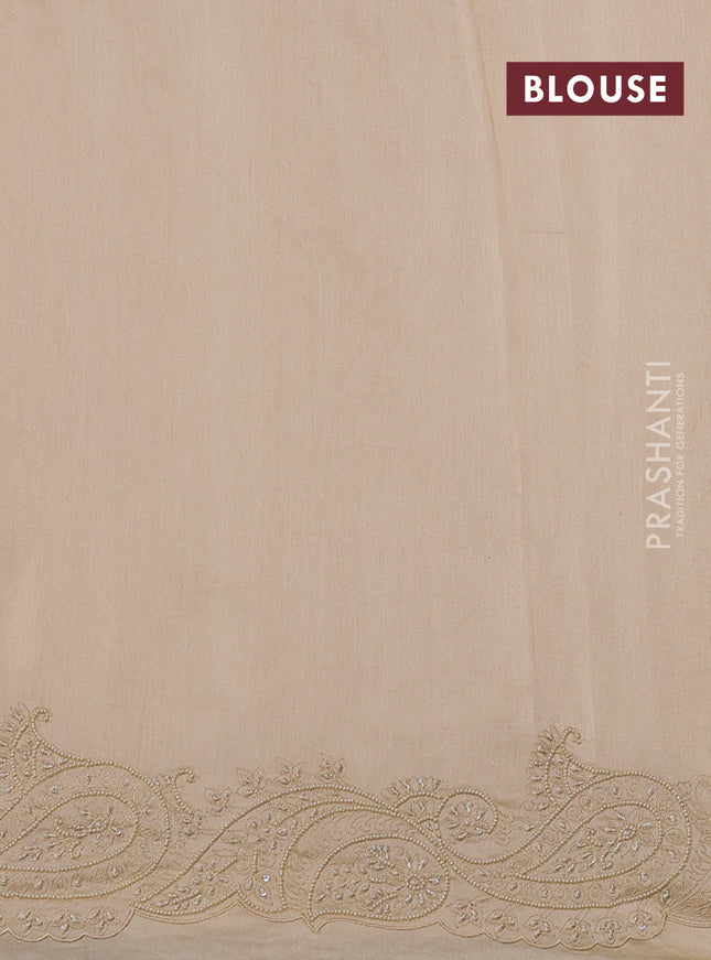 Pure organza silk saree cream with mirror embroidery buttas and embroidered beaded border