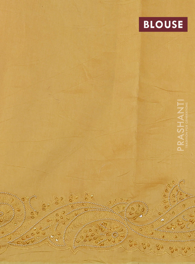 Pure organza silk saree yellow with mirror embroidery buttas and embroidered beaded border