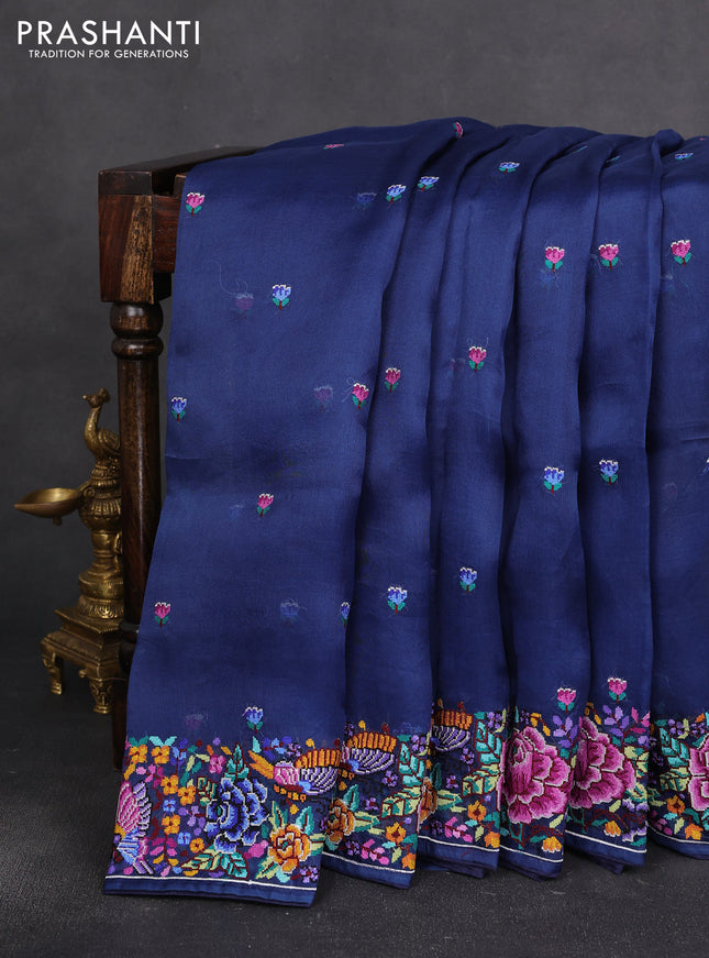 Pure organza silk saree navy blue with floral embroidery buttas and convent embroidery border