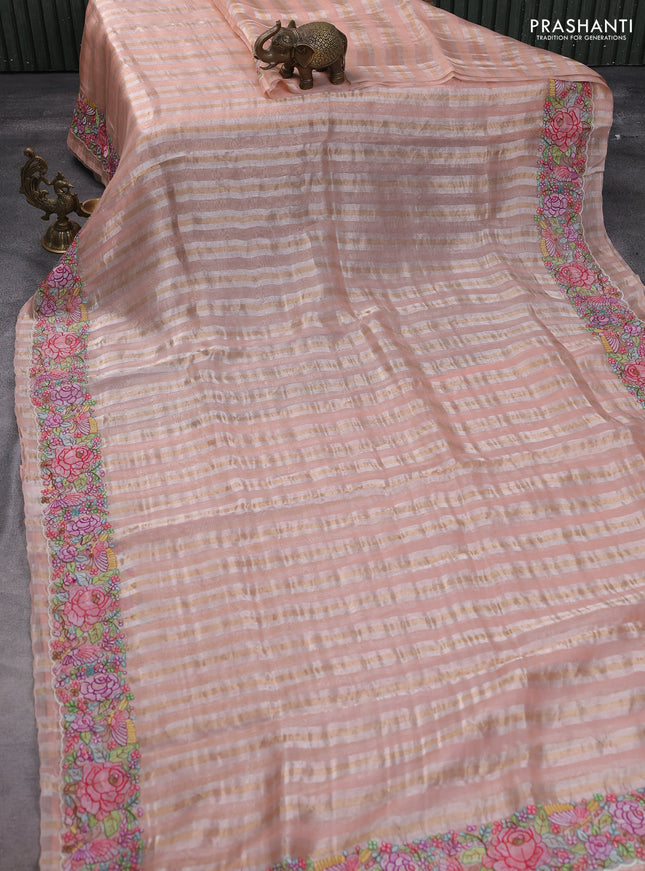 Pure organza silk saree peach pink with allover silver & gold stripes pattern and embroidered border