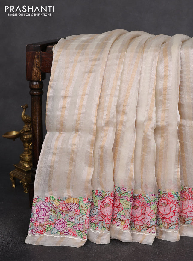 Pure organza silk saree off white with allover zari stripe pattern & zardosi work and embroidered border