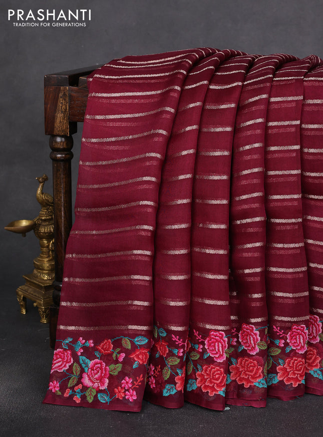 Pure organza silk saree wine shade with allover zari weaves and floral convent embroiderey border