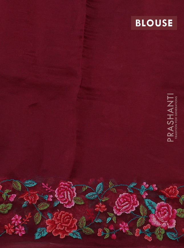 Pure organza silk saree wine shade with allover zari weaves and floral convent embroiderey border
