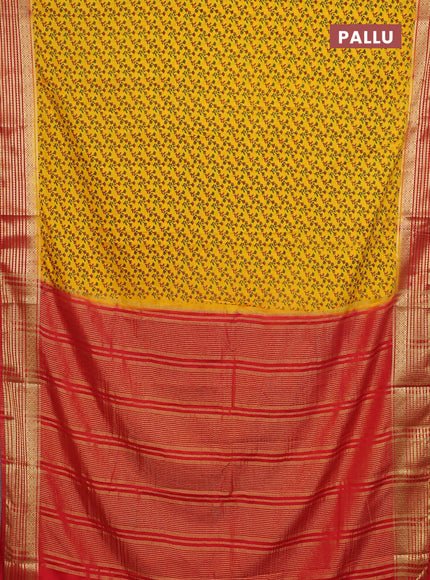 Semi mysore silk saree yellow and red with allover prints and zari woven border