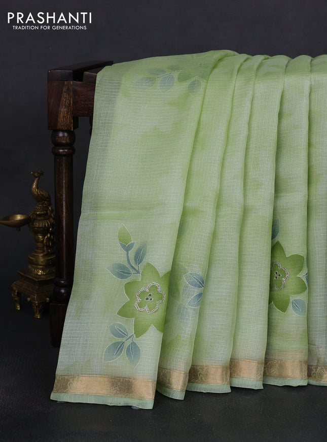 Silk kota saree pista green with floral embroidery buttas and zari woven border