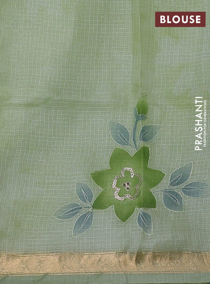 Silk kota saree pista green with floral embroidery buttas and zari woven border