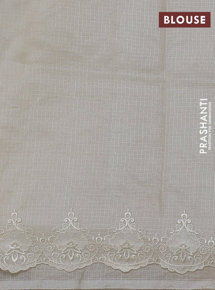 Silk kota saree cream with allover floral embroidery and embroidery border