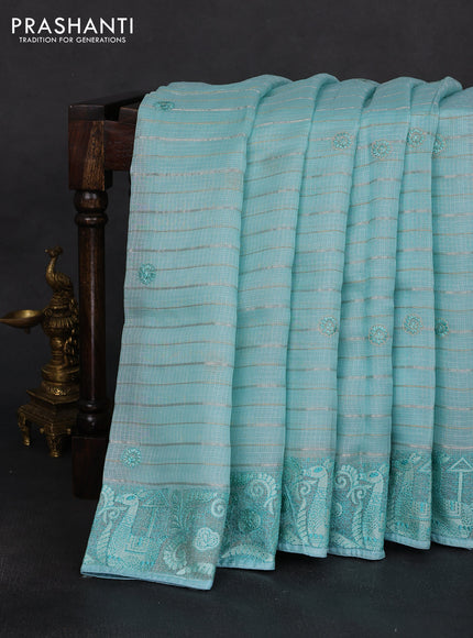 Silk kota saree light blue with allover silver & gold zari stripe pattern and embroidery border
