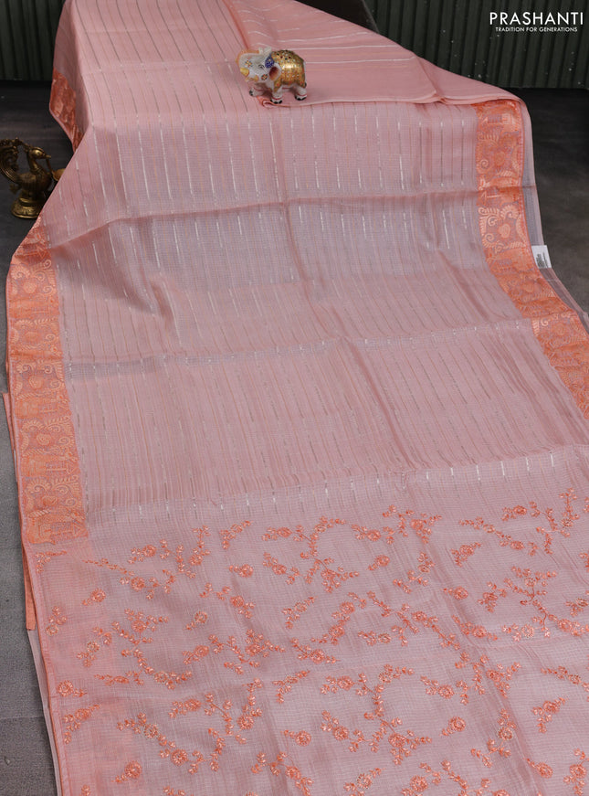 Silk kota saree peach shade with allover silver & gold zari stripe pattern and embroidery border