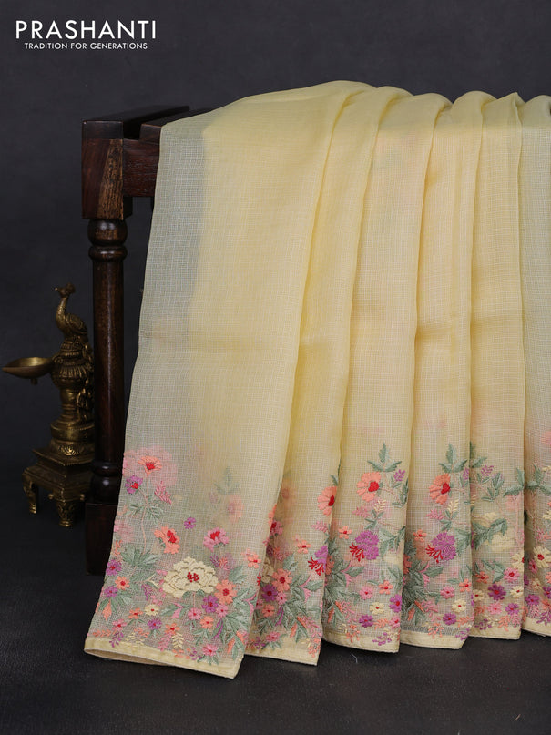 Silk kota saree pale yellow with plain body and floral embroidery border