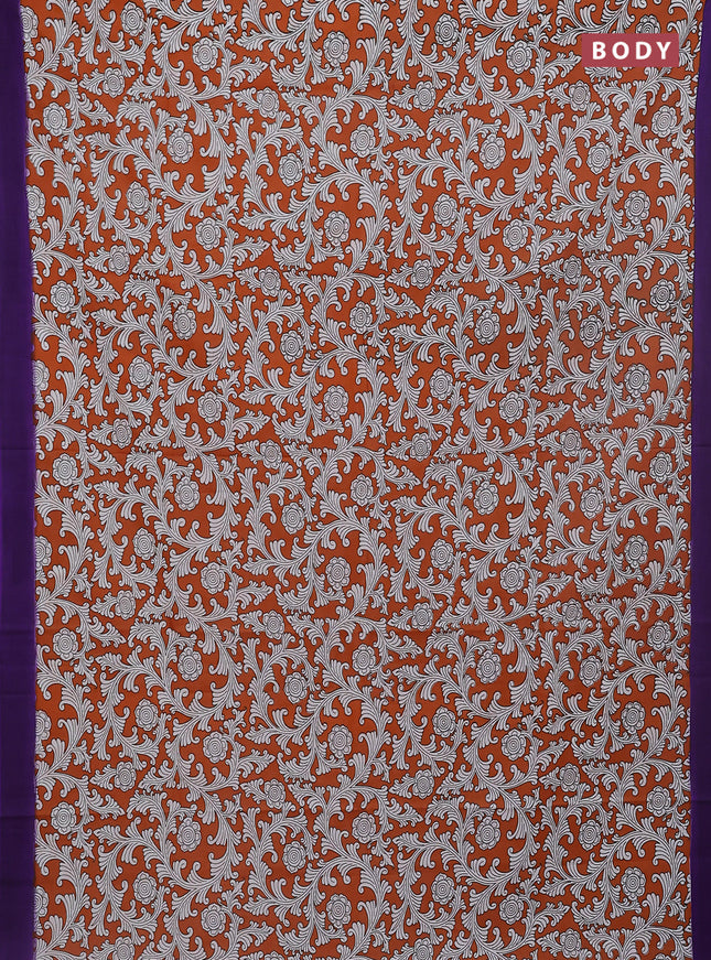 Kalamkari semi silk saree rustic orange and violet with allover prints and simple border