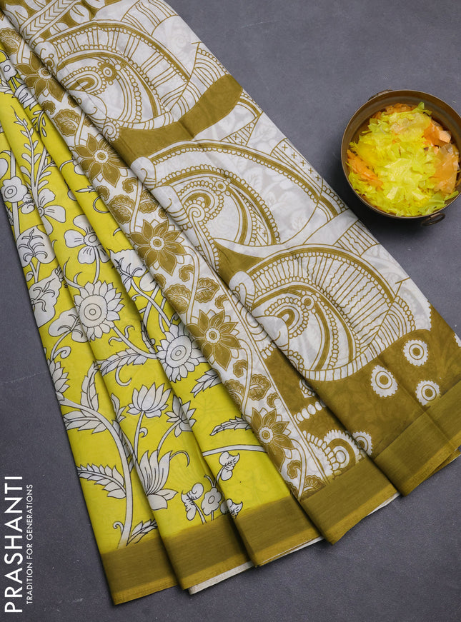 Kalamkari semi silk saree yellow and light green with allover prints and simple border