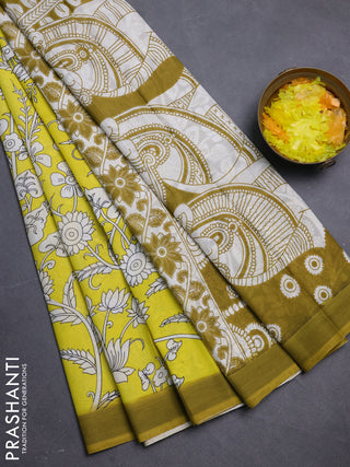 Kalamkari semi silk saree yellow and light green with allover prints and simple border