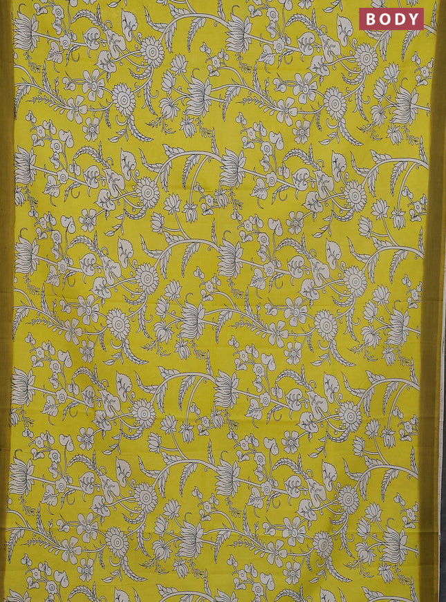 Kalamkari semi silk saree yellow and light green with allover prints and simple border