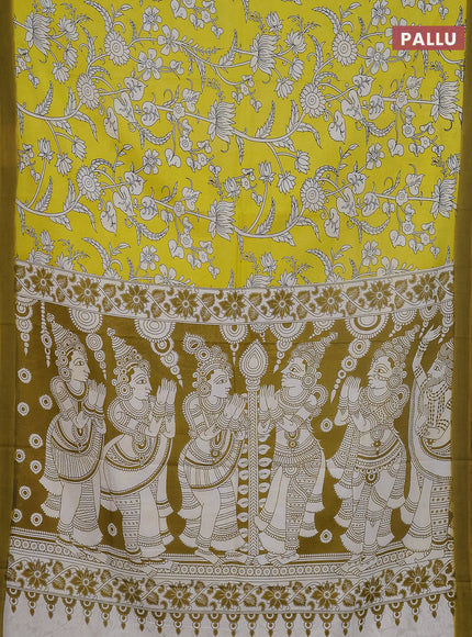 Kalamkari semi silk saree yellow and light green with allover prints and simple border
