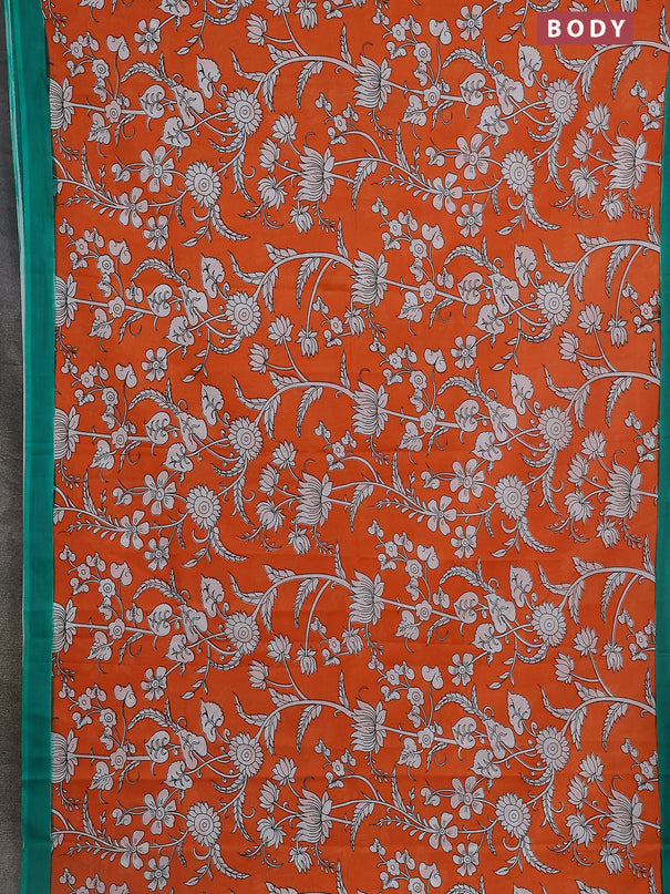 Kalamkari semi silk saree orange and green with allover prints and simple border