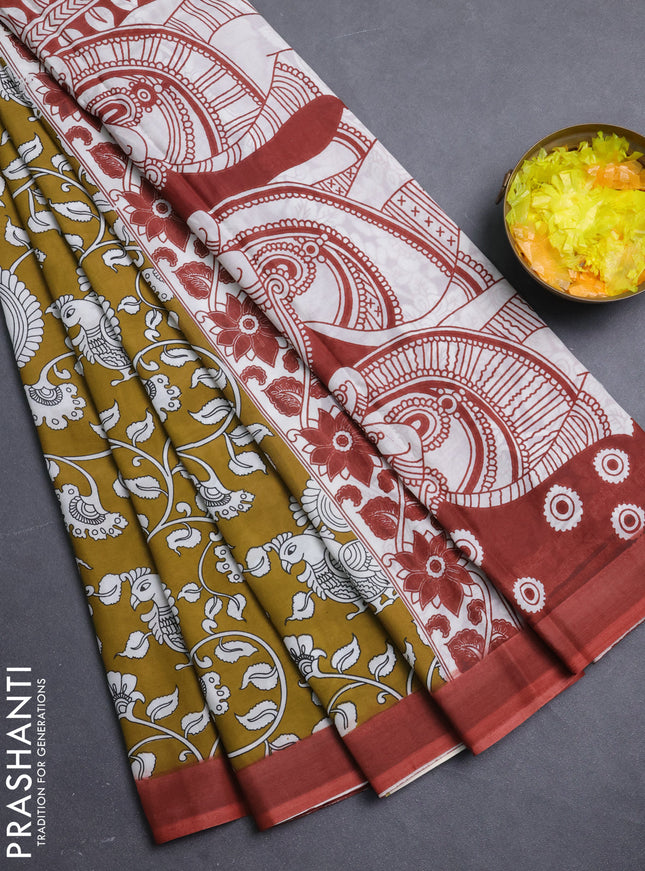 Kalamkari semi silk saree mustard yellow and rust shade with allover prints and simple border