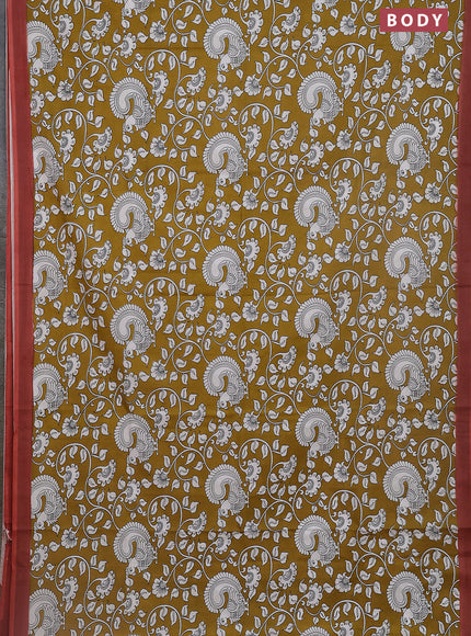 Kalamkari semi silk saree mustard yellow and rust shade with allover prints and simple border