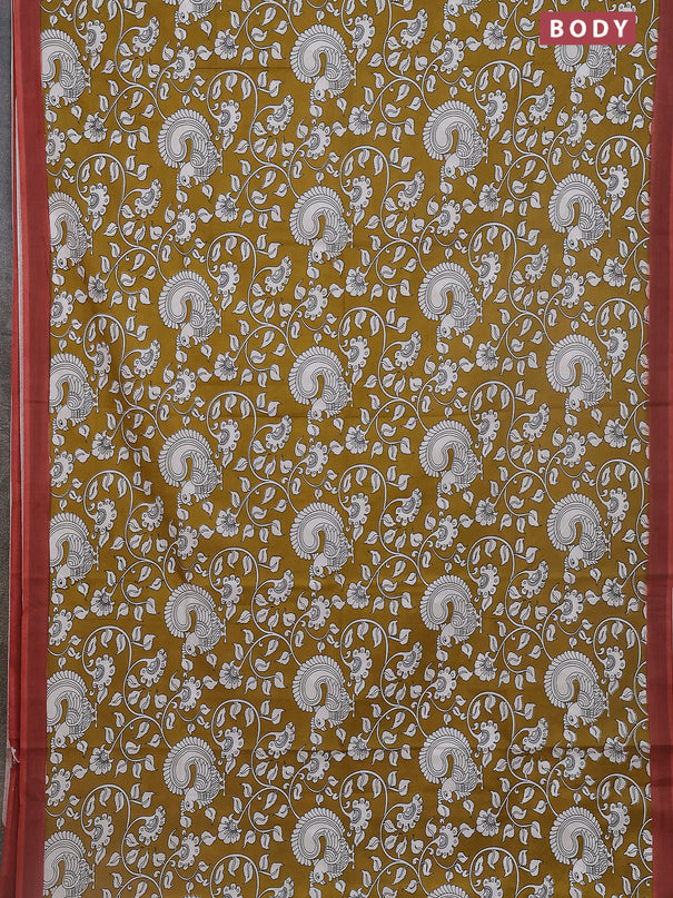 Kalamkari semi silk saree mustard yellow and rust shade with allover prints and simple border