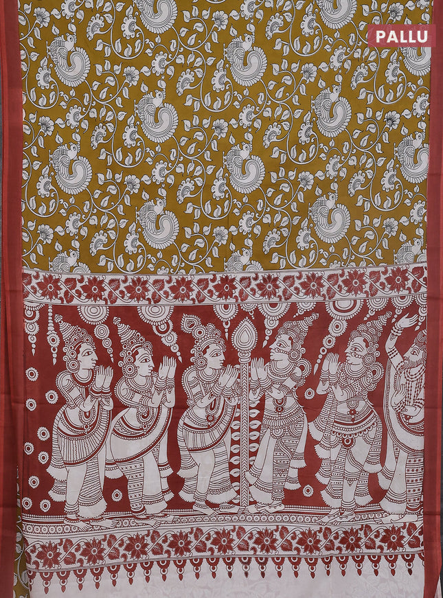 Kalamkari semi silk saree mustard yellow and rust shade with allover prints and simple border