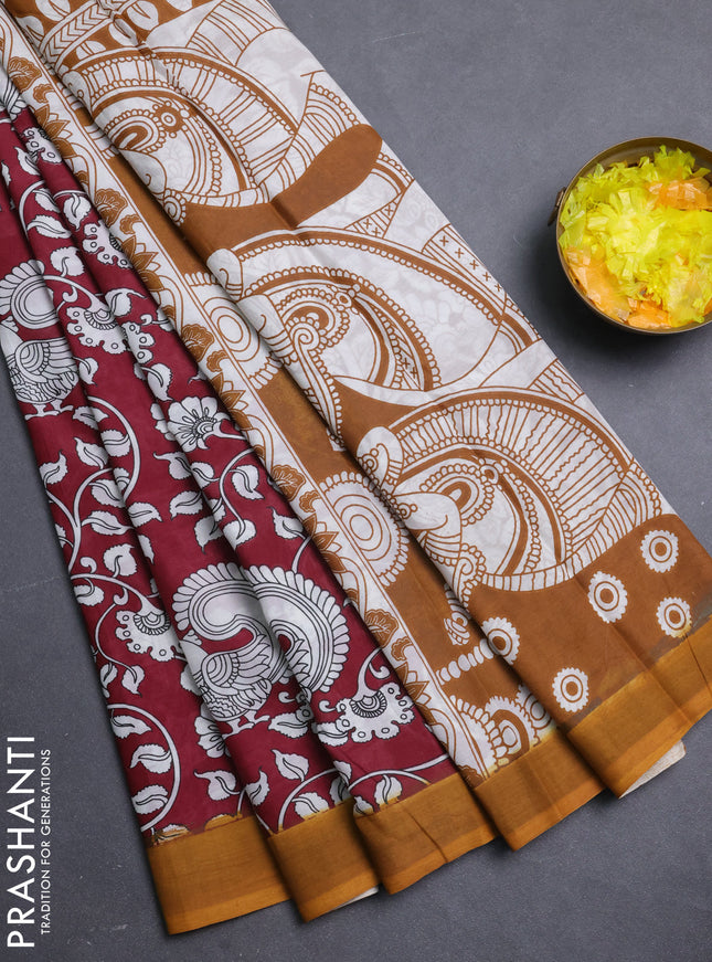 Kalamkari semi silk saree maroon and mustard yellow with allover prints and simple border