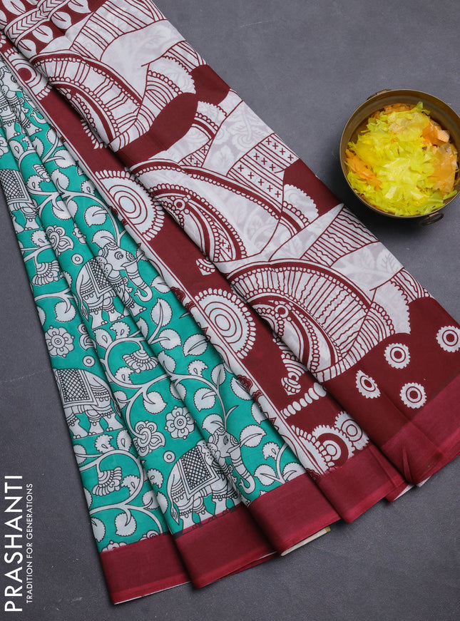Kalamkari semi silk saree teal green and mauve pink with allover prints and simple border