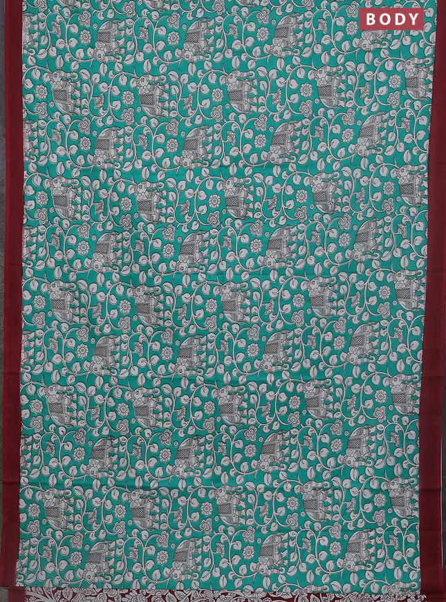Kalamkari semi silk saree teal green and mauve pink with allover prints and simple border