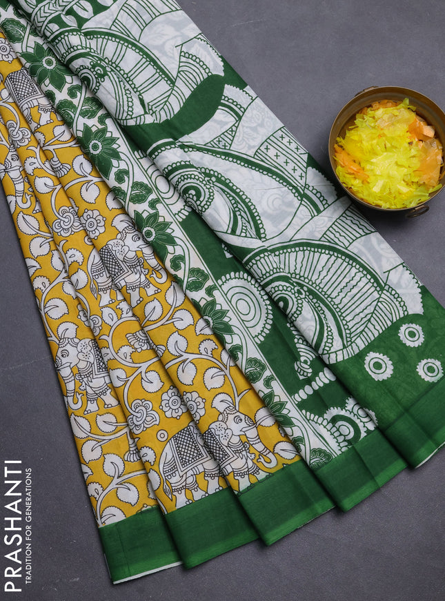 Kalamkari semi silk saree yellow and green with allover prints and simple border