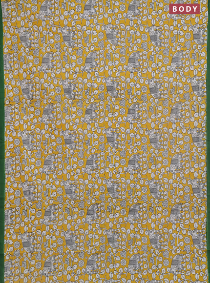 Kalamkari semi silk saree yellow and green with allover prints and simple border