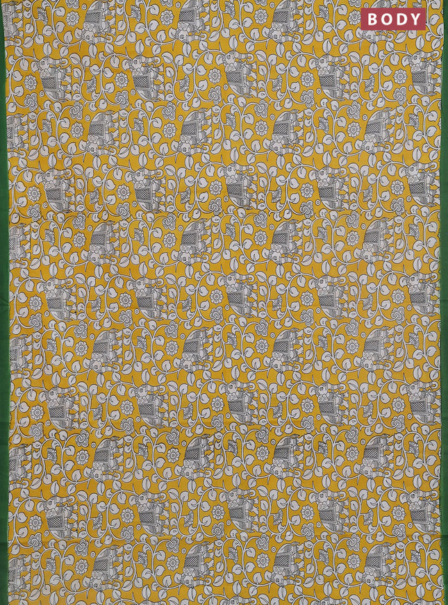 Kalamkari semi silk saree yellow and green with allover prints and simple border
