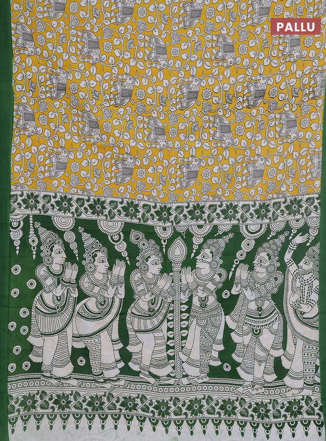 Kalamkari semi silk saree yellow and green with allover prints and simple border