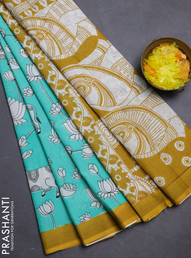 Kalamkari semi silk saree teal green and yellow with allover pichwai prints and simple border