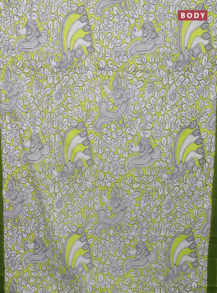 Kalamkari semi silk saree fluorescent green and green with allover prints and simple border