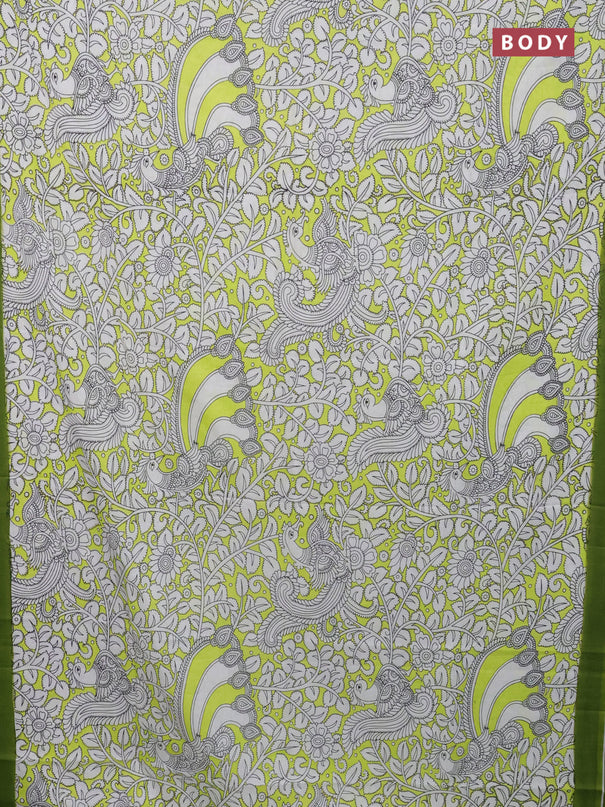 Kalamkari semi silk saree fluorescent green and green with allover prints and simple border