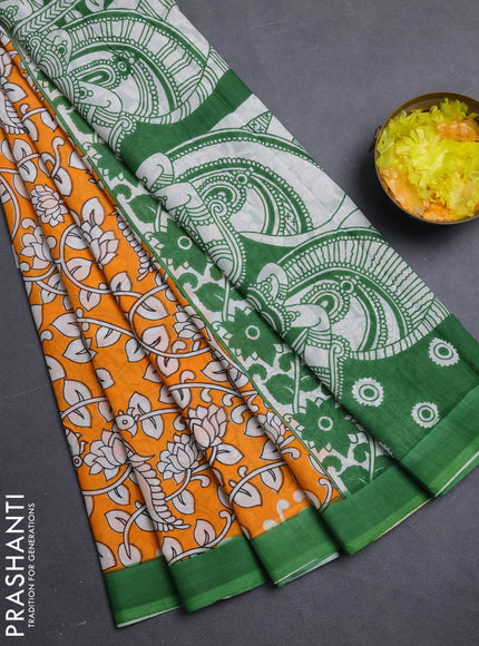 Kalamkari semi silk saree orange and green with allover prints and simple border