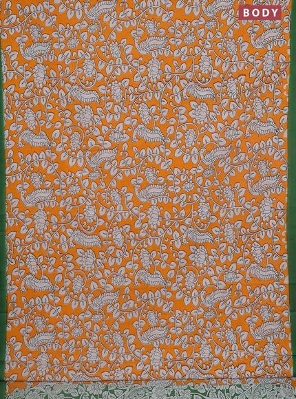 Kalamkari semi silk saree orange and green with allover prints and simple border
