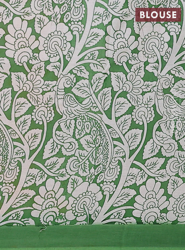 Kalamkari semi silk saree orange and green with allover prints and simple border