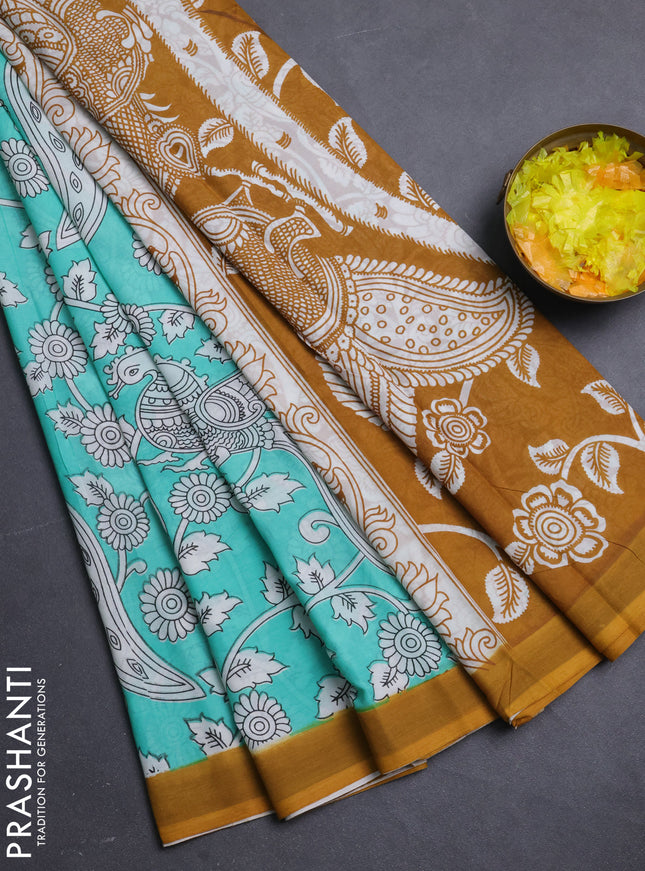 Kalamkari semi silk saree teal green and mustard yellow with allover prints and simple border