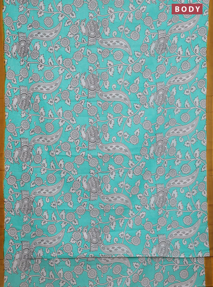 Kalamkari semi silk saree teal green and mustard yellow with allover prints and simple border
