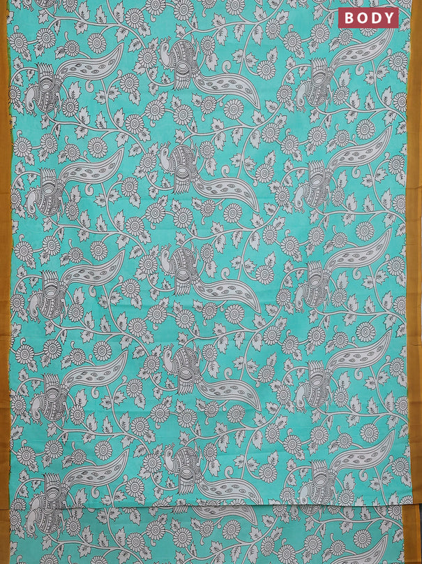 Kalamkari semi silk saree teal green and mustard yellow with allover prints and simple border