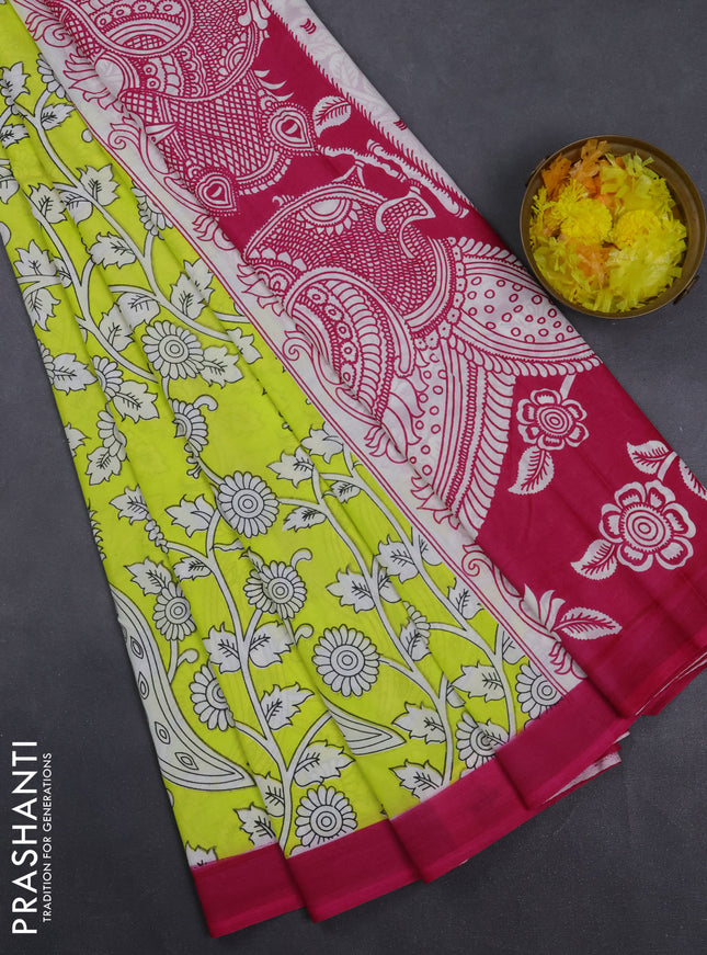 Kalamkari semi silk saree fluorescent green and pink with allover prints and simple border