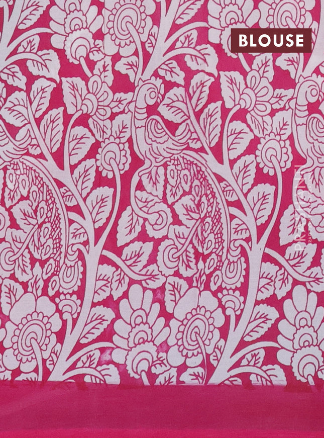 Kalamkari semi silk saree fluorescent green and pink with allover prints and simple border