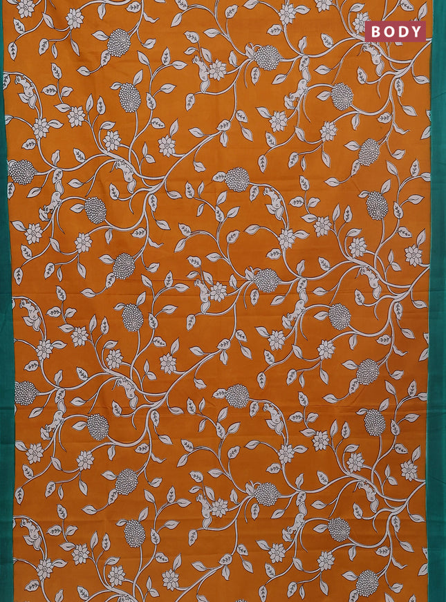 Kalamkari semi silk saree dark mustard and teal green with allover prints and simple border