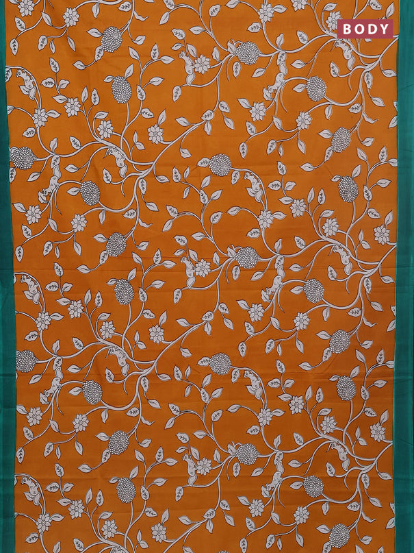 Kalamkari semi silk saree dark mustard and teal green with allover prints and simple border