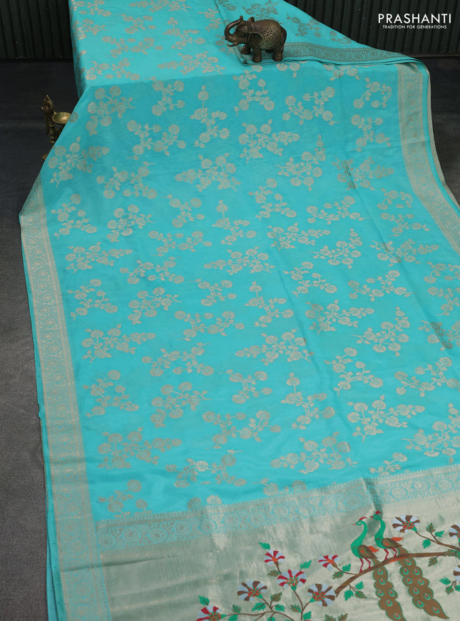 Banarasi semi georgette saree teal blue with allover zari woven floral brocade weaves and zari woven border