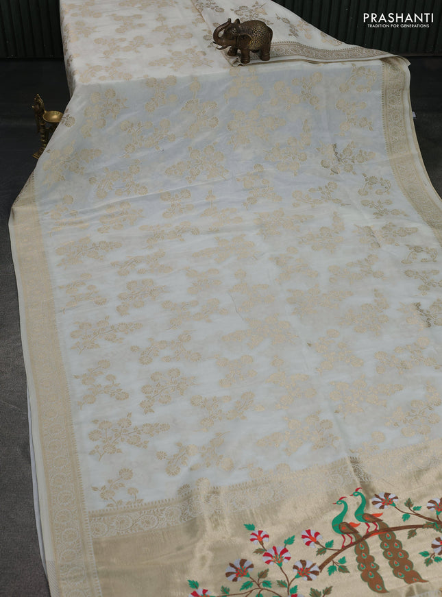 Banarasi semi georgette saree off white with allover zari woven floral brocade weaves and zari woven border