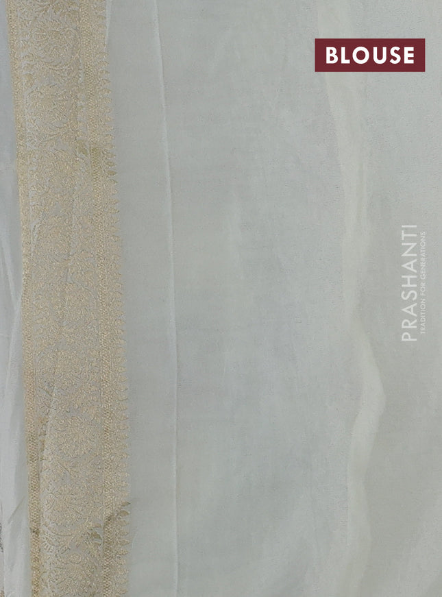 Banarasi semi georgette saree off white with allover zari woven floral brocade weaves and zari woven border
