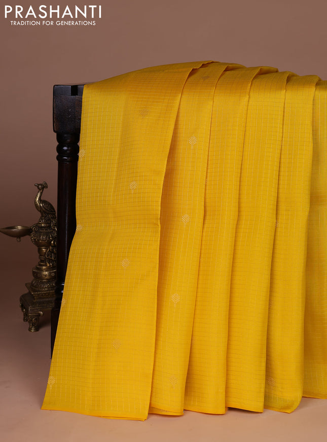 Kanchipuram silk saree yellow and teal green with allover zari checked pattern & buttas in borderless style