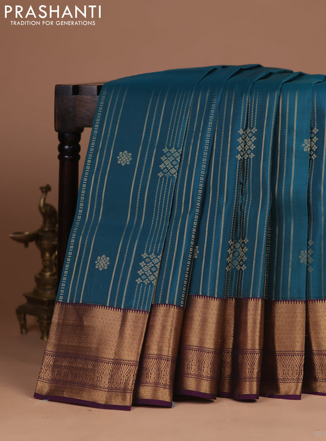 Kanchipuram silk saree peacock green and wine shade with allover zari weaves & buttas and temple zari woven border