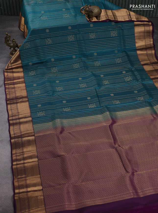 Kanchipuram silk saree peacock green and wine shade with allover zari weaves & buttas and temple zari woven border